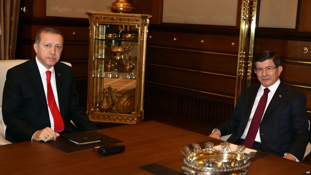 Turkey's President Recep Tayyip Erdogan left with Prime Minister Ahmet Davutoglu before a meeting in Ankara Aug. 25 2015