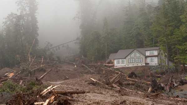 Recovery crews halt work while a trained cadaver dog scents the site where the body of 62yearold William Stortz is thought to be located A dog previously alerted at the location of the green stake in the center of the image (KCAW