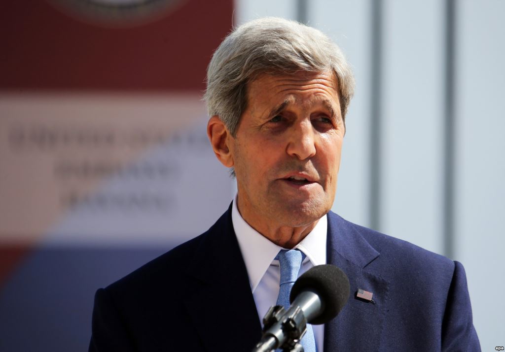 U.S. Secretary of State John Kerry listens at the East Asia Summit Foreign Ministers Meeting in Kuala Lumpur Malaysia