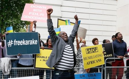 Protesters demanding the release of Rwanda's intelligence chief Karenzi Karake outside Westminster Magistrates Court