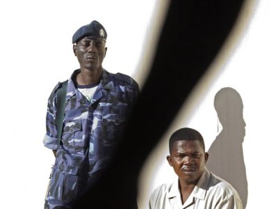 Police officer reporter observe ballot counting in South Sudan