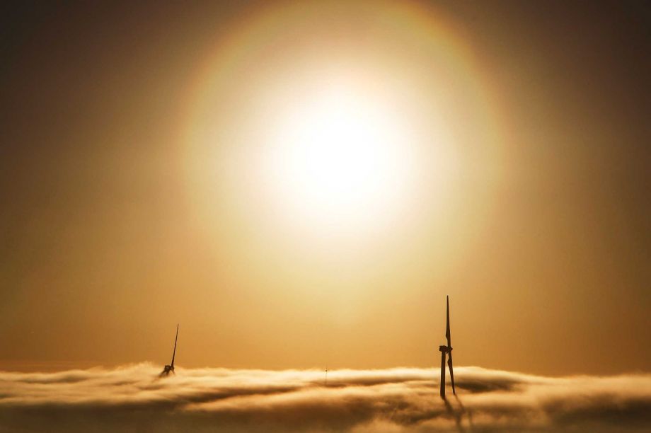 Fog envelops wind turbines at the BP Sherbino Mesa II Wind Farm west of Fort Stockton. Texas leads the nation in wind power capacity