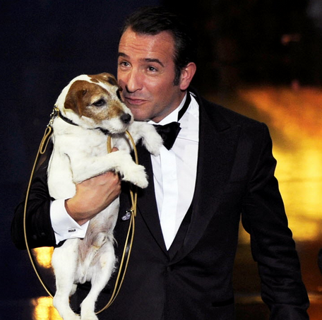 Uggie seen with Jean Dujardin on their Oscar-winning night for'The Artist. | Mark J. Terrill  AP