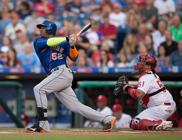 PHILADELPHIA PA- AUGUST 25 Yoenis Cespedes #52 of the New York Mets hits a two run home run in the top of the first inning against the Philadelphia Phillies