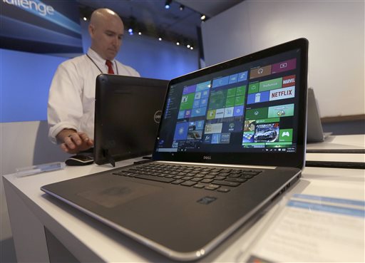 Dell laptop computer running Windows 10 is on display at the Microsoft Build conference in San Francisco. Microsoft’s new Windows 10 operating system debuts Wednesday