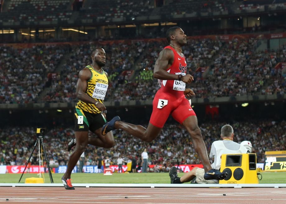 United States Justin Gatlin right and Jamaica's Nickel Ashmeade compete in round one of the men’s 200m at the World Athletics Championships at the Bird's Nest stadium in Beijing Tuesday Aug. 25 2015