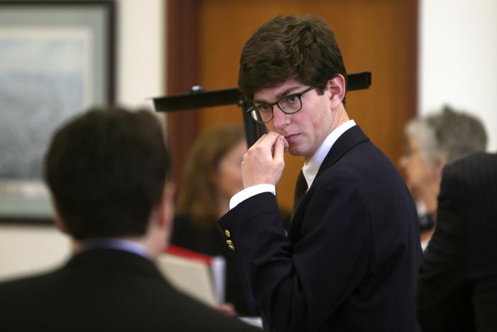 Former St Paul's student Owen Labrie confers with his lawyer before the start of the second day of his trial at Merrimack County Superior Court in Concord NH