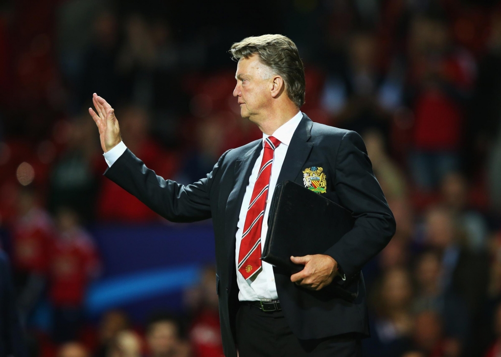 MANCHESTER ENGLAND AUGUST 18 Louis van Gaal manager of Manchester United celebrates victory after the UEFA Champions League Qualifying Round Play Off First Leg match between Manchester United and Club Brugge at Old Trafford