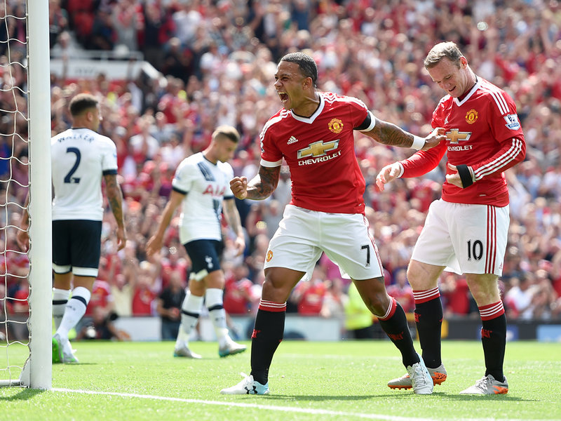 Wayne Rooney and Memphis Depay celebrate Kyle Walker's own goal