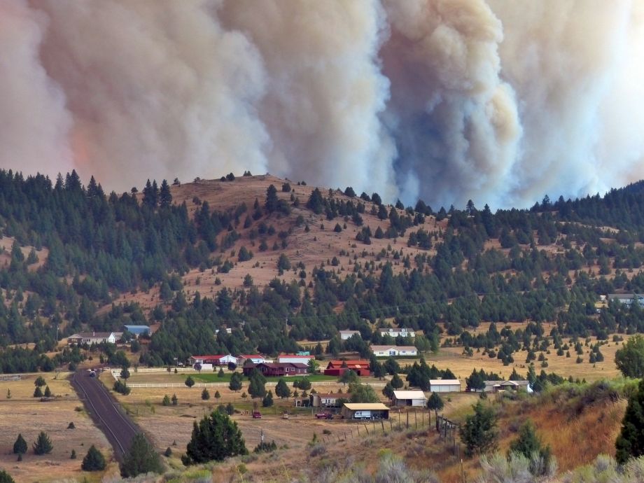 The Canyon Creek Complex fire burns towards a rural subdivision of John Day on Friday Aug. 14 2015. Homes in the area were ordered evacuated as the fire burned out of control