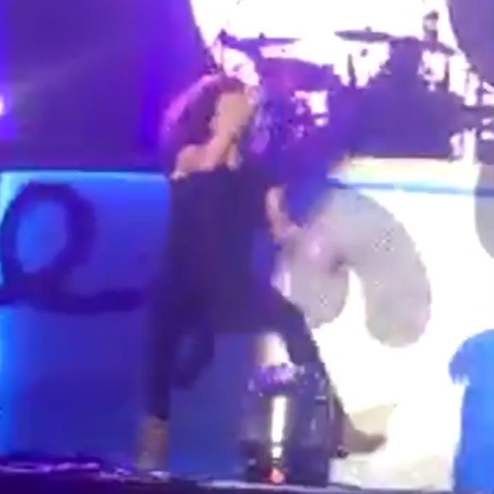 Whoops! Harry Styles falls on stage again