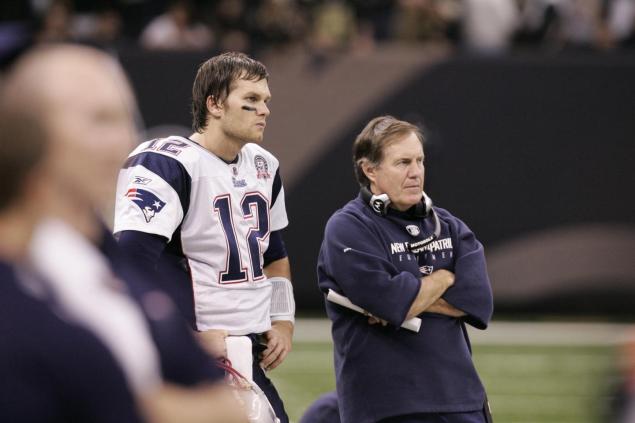 Patriots quarterback Tom Brady seen here with coach Bill Belichick is suspended four games for his alleged role in DeflateGate