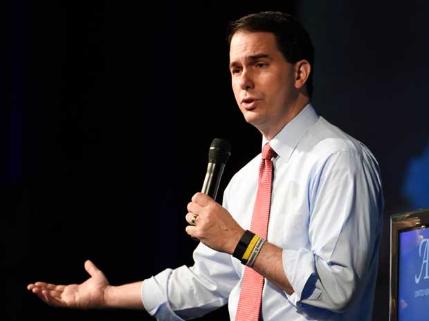 Wisconsin Gov. Scott Walker speaks in San Diego on July 23. Walker's recent poll results earned him a place in the first prime time Republican presidential debate set for Thursday