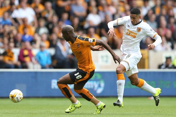 Wolverhampton Wanderers&#x27 Benik Afobe and Hull's Curtis Davies in action