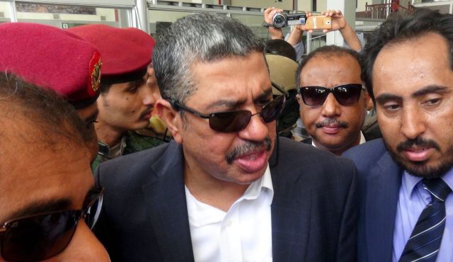 Yemen Prime Minister Khaled Bahah talks to reporters upon his arrival at Aden airport