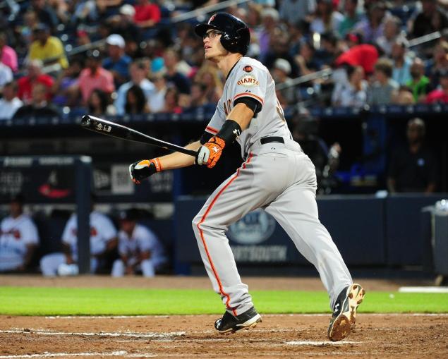 Giants rookie Kelby Tomlinson seen here in first career start on Wednesday night at Turner Field in Atlanta dedicated his first hit on Monday night to Bee Jays batboy Kaiser Carlile