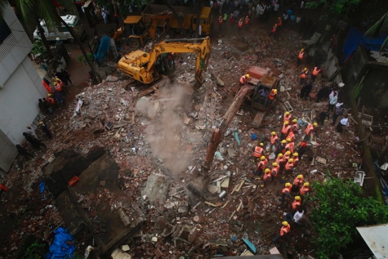 India building collapse: Seven killed and 17 trapped