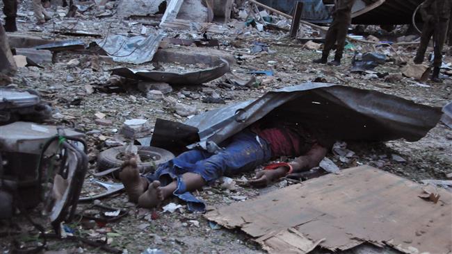 A body lies in the rubble near the Jazeera Palace Hotel following a terrorist attack in the capital city of Mogadishu Somalia