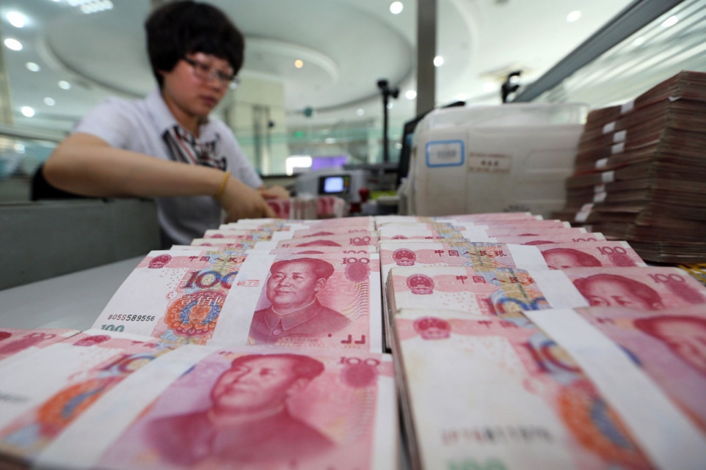 China's central bank on August 11 devalued its yuan currency by nearly two percent against the US dollar as authorities seek to push market reforms