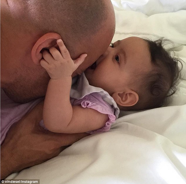 Photo: Vin Diesel snuggles up to baby daughter