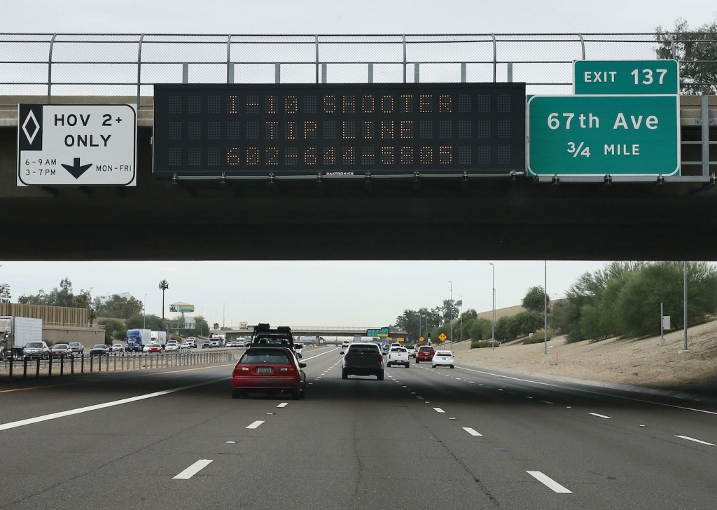 A tip line for motorist is seen on a freeway sign along I-10 Thursday Sept. 10 2015 in Phoenix