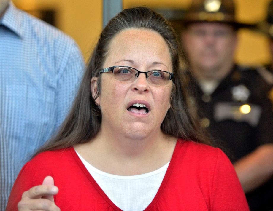 Rowan County Clerk Kim Davis makes a statement to the media at the front door of the Rowan County Judicial Center in Morehead Ky. Monday Sept. 14 2015. Davis announced that her office will issue marriage licenses under order of a federal judge but