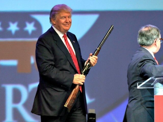 Trump with rifle AP