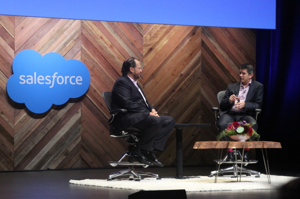 Salesforce CEO Marc Benioff and Uber CEO Travis Kalanick on stage during a fireside chat at Dreamforce 2015