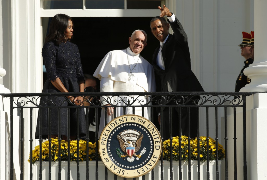 President Barack Obama and first lady Michelle Obama welcome Pope Francis during an official welcoming ceremony at the White House Wednesday