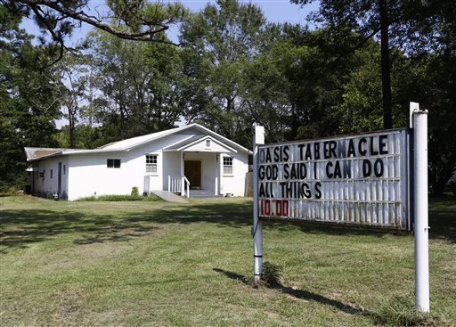 The Oasis Tabernacle Church is seen in East Selma Ala. on Sunday Sept. 20 2015. Dallas County District Attorney Michael Jackson says suspect James Minter has been charged with three counts of attempted murder after allegedly shooting a woman an infan