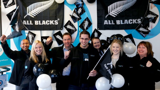 Noone Plus staff get into the spirit of the Rugby World Cup and show their support for the All Blacks. From left Kashyap Hari Samantha Milliken Nick Noone Scotty Jenkin Lauren Fogarty Hannah Leonard and Julie Clark