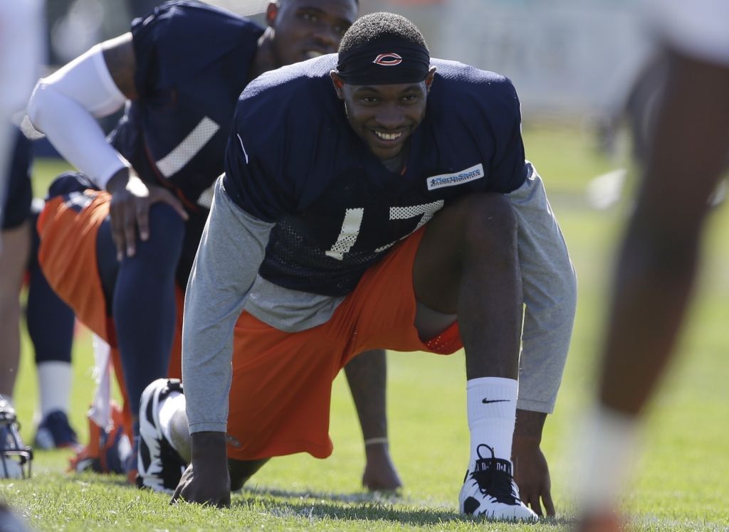 Chicago Bears wide receiver Alshon Jeffery smiles as he stretches during an NFL football training camp
at Olivet Nazarene University Thursday