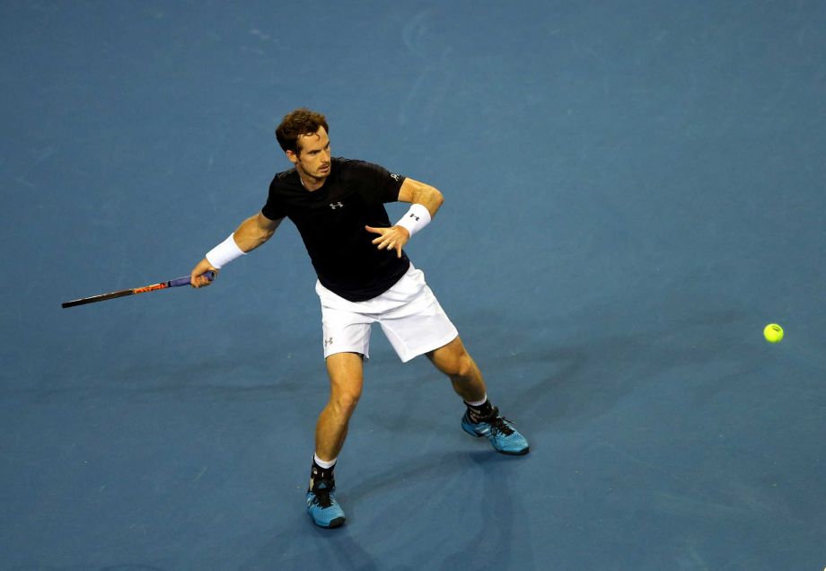 Britain's Andy Murray plays a return to Australia's Thanasi Kokkinakis during the semifinal tennis matches of the Davis Cup in Glasgow Friday Sept. 18 2015