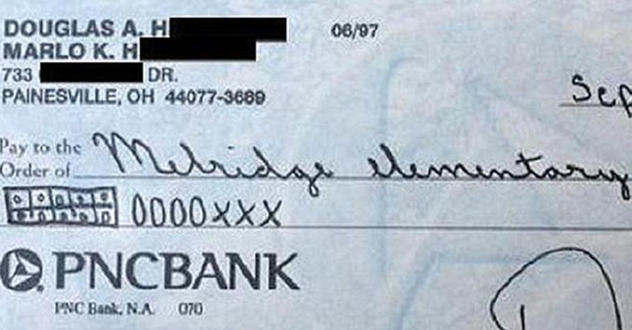 Father writes check using Common Core math