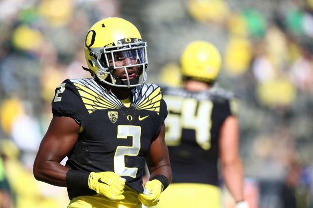 Oregon wide receiver Bralon Addison warms up before an NCAA college football game against Eastern Washington in Eugene Ore. Oregon’s receiver who sat out last season because of injury was named the Pac-12's