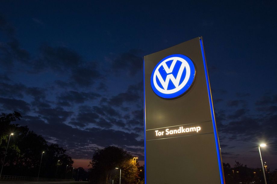 A logo of German car manufacturing giant Volkswagen is seen outside their headquarters in Wolfsburg