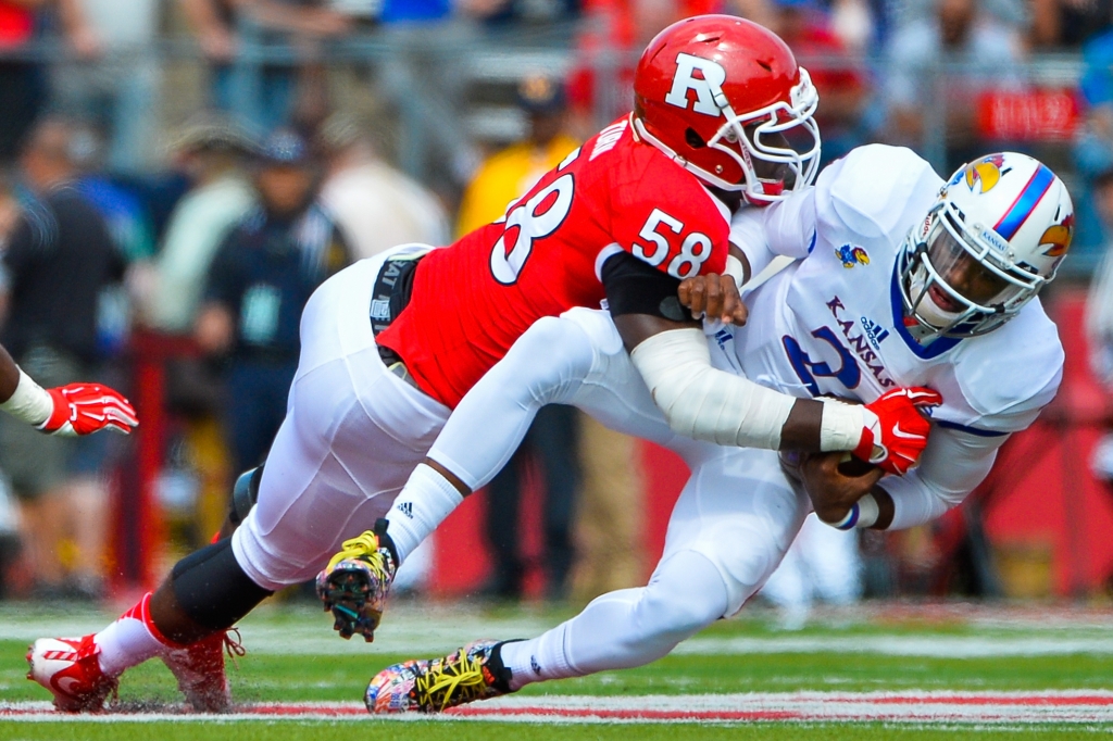 Rutgers&#039 Kemoko Turay left sacks Kansas&#039 Montell Cozart during the second quarter at High Point Solutions Stadium in Piscataway New Jersey on Sept. 26 2015