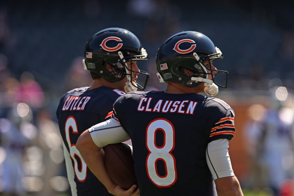 Bears quarterbacks Jay Cutler left and Jimmy Clausen