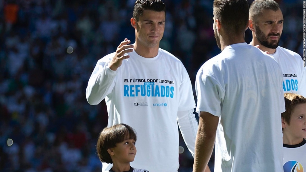 Cristiano Ronaldo may not have scored his 500th career goal at the weekend but he did walk out at the Bernabeu with the son of the Syrian refugee tripped by a Hungarian journalist. Osama Alabed Al Mohsen and his 7-year-old son Zied