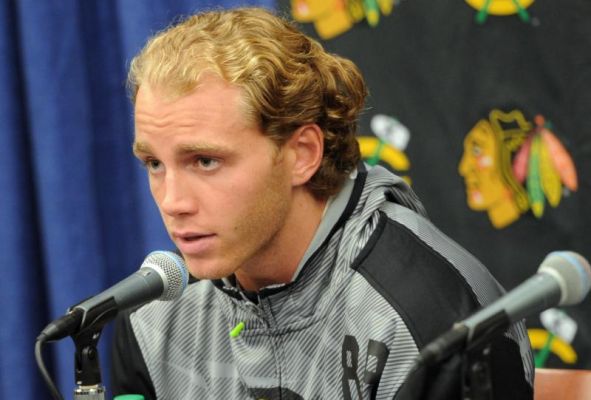 Chicago Blackhawks Patrick Kane answers a question during