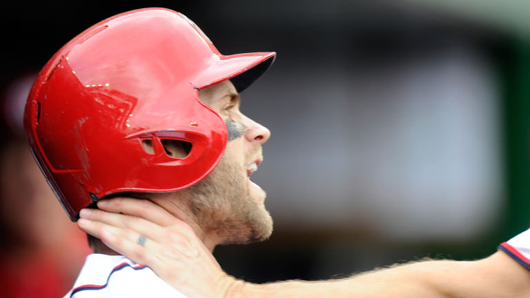 Bryce Harper was grabbed by the throat