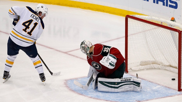 The Sabres&#39 Jack Eichel beats Wild goalie Darcy Kuemper during the third period of Monday's NHL pre-season game in St. Paul Minn. Eichel's goal in his exhibition debut was his only shot of the game. He finished plus-1 in 17 minutes 26 seconds