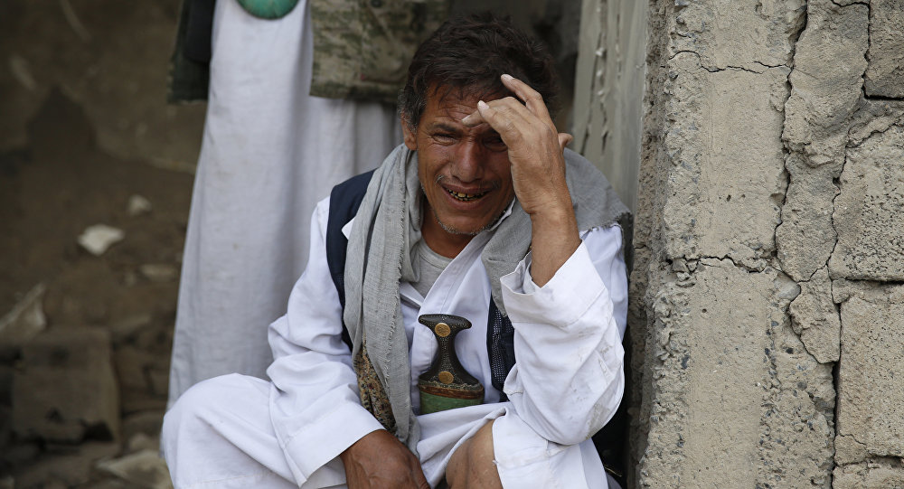 A man cries after some of his relatives were killed in a Saudi-led airstrike in Sanaa Yemen Monday Sept. 21 2015