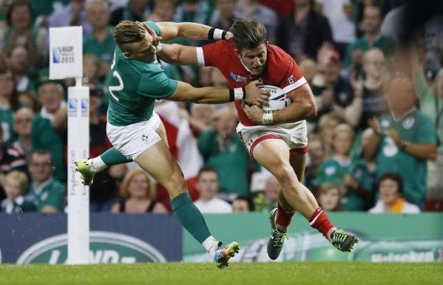 Canada's DTH van der Merwe runs in their first try against Ireland at Cardiff