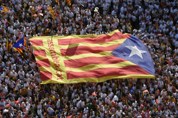 AFP  Lluis Gene Demonstrators unfold a big'Estelada  during celebrations on Catalonia's National Day which recalls the final defeat of local troops by Spanish king Philip V's forces in 1714 in Barcelona Septem