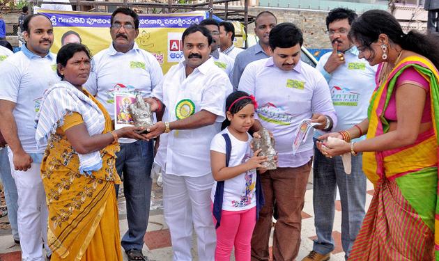 Clay idols of Lord Ganesha being distributed on the Beach Road in Visakhapatnam on Sunday