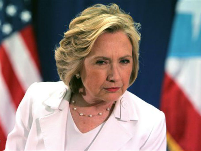 Democratic presidential candidate Hillary Rodham Clinton listens to a question during a news conference after a roundtable to discuss the health care crisis in San Juan Puerto Rico Friday Sept. 4 2015