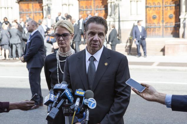 Gov. Andrew Cuomo and his partner Sandra Lee at a press conference to discuss tougher federal gun laws after the funeral of Carey Gabay 43 Saturday at Emmanuel Baptist Church in Brooklyn