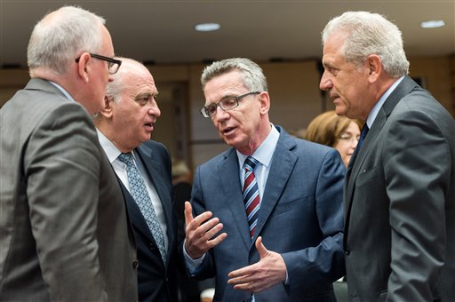 German Interior Minister Thomas de Maiziere talks with European Commission First Vice President Frans Timmermans European Commissioner for Migration and Home Affairs Dimitris Avramopoulos and Spanish Interior Minister Jorge F