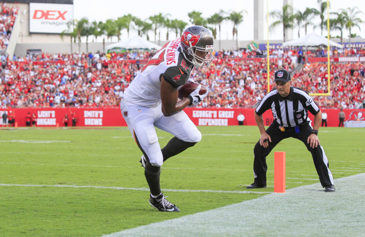 Bucs tight end Austin Seferian Jenkins hauls in a 5-yard touchdown in the opener against Tennessee